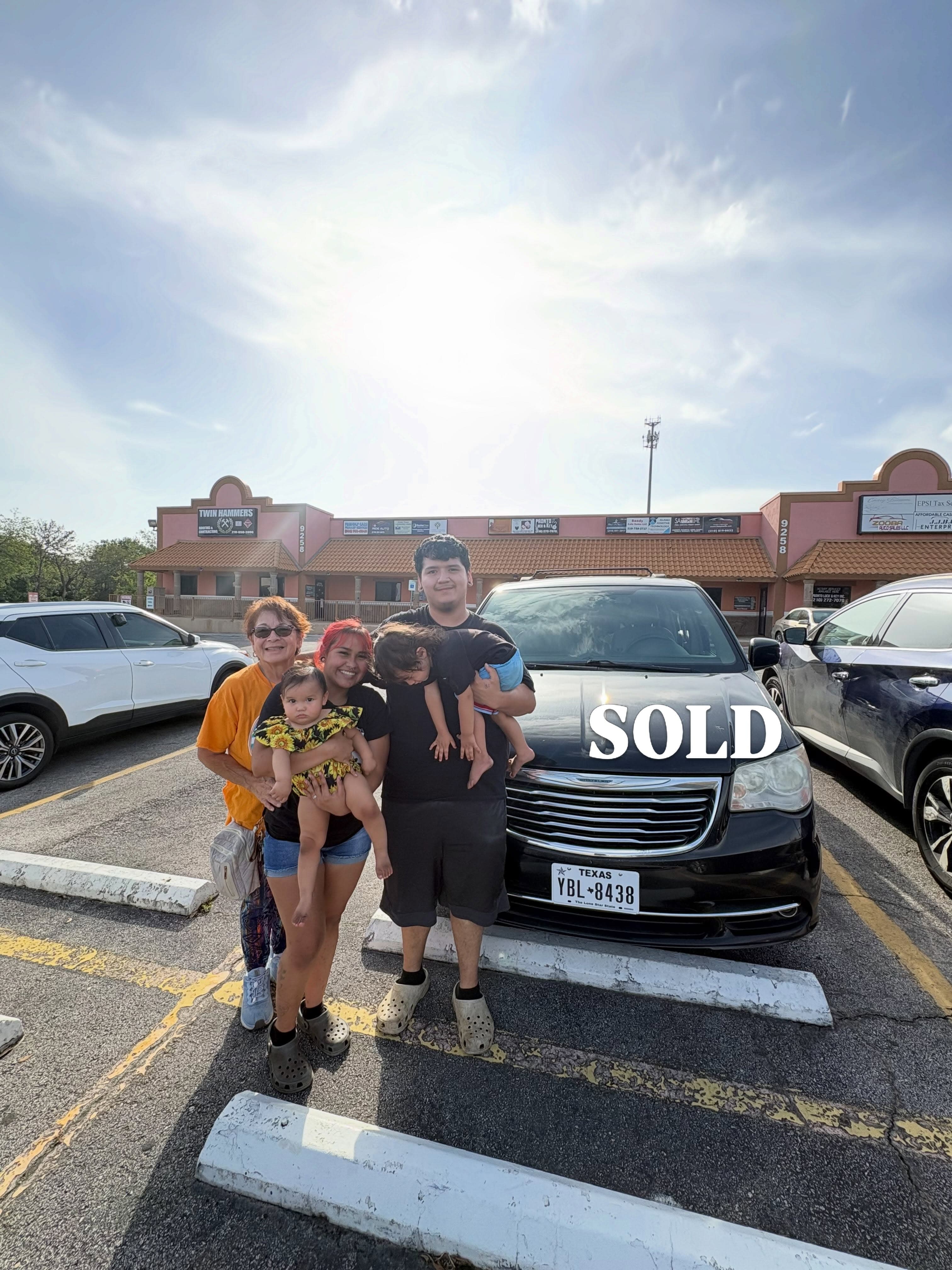 A family picking up their next ride together.